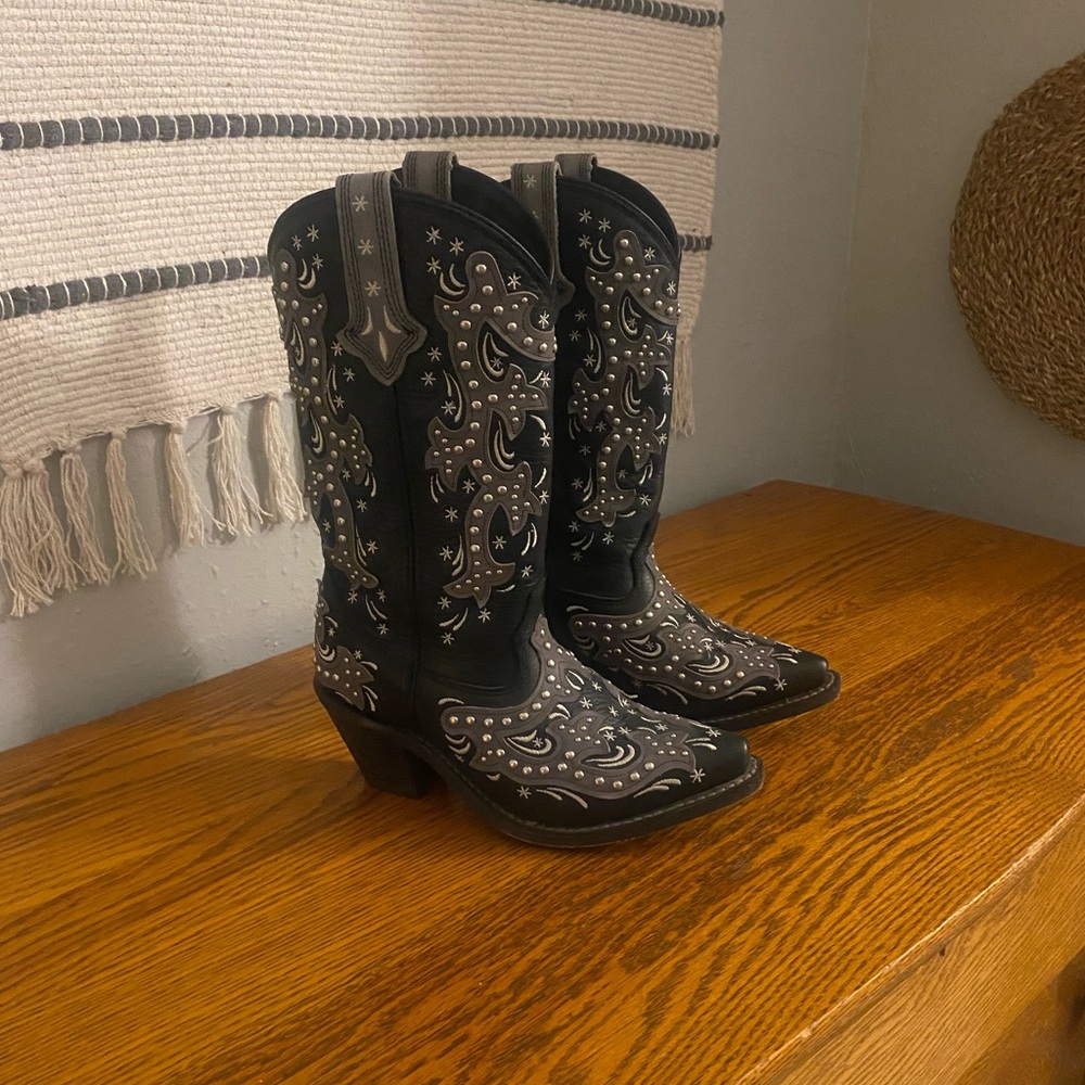 Black and Silver Heeled Boots with Intricate Design